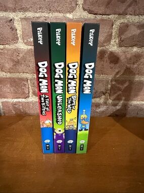 Bundle of 4 hard back Dog Man Books by Dav Pilkey -scholastic